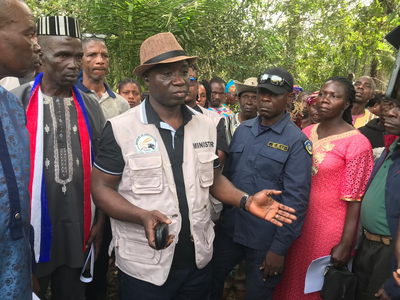 Minister Nuetah in conversation with farmers about his field mission