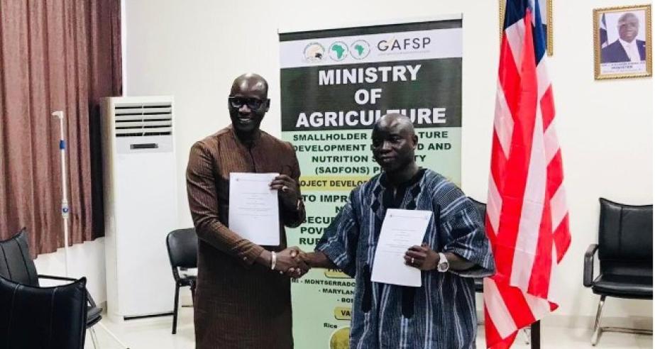 (L-R) WFP’s Representative to Liberia, Dr. Aliou Diongue and Minister of Agriculture, Liberia, Dr. J Alexander Nuetah,(PhD)