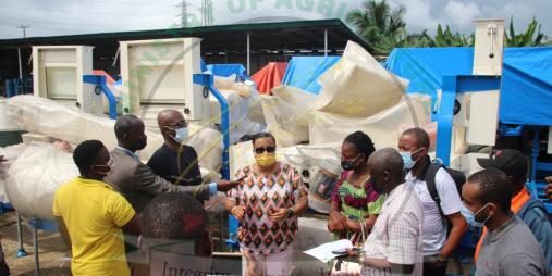 Minister of Agriculture, Honorable Jeannie Milly Cooper makes remarks during the handover of agro processing equipment to beneficiaries
